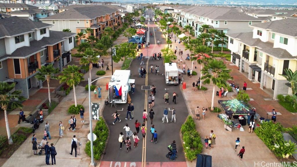 91-1171 Hoʻonaʻauao Street, Unit 1103 Kapolei, HI 96707 - Photo 7 of 15 an aerial view of multiple house