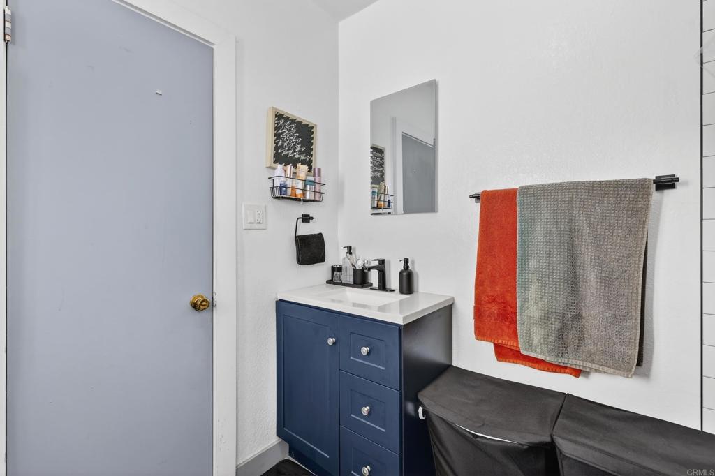 1530 East Appleton Street Long Beach, CA 90802 - Photo 22 of 61 a view of bathroom with a sink and a mirror