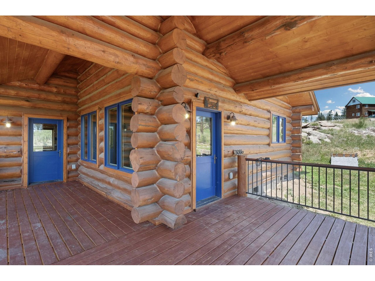 3086 Davis Ranch Road Bellvue, CO 80512 - Photo 21 of 33 Front door and huge deck