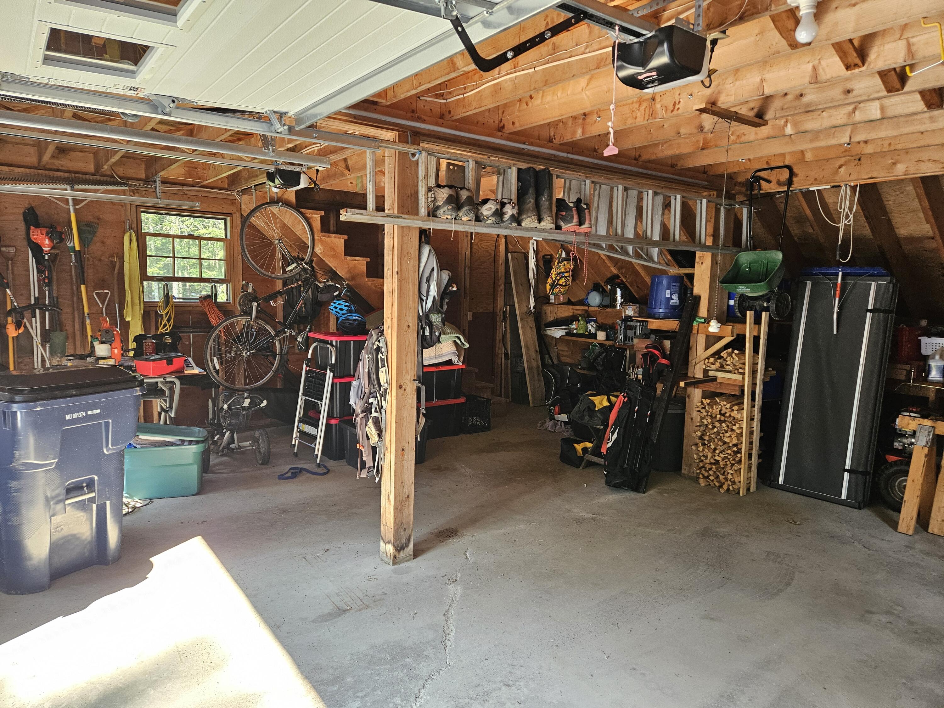 901 Mann Hill Road Holden, ME 04429 - Photo 39 of 54 36 Inside Garage storage upstairs