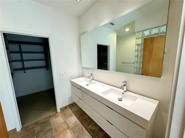 a view of empty room with windows