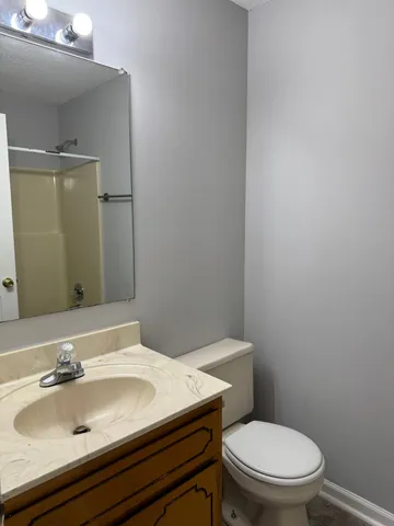 a bathroom with a sink and a toilet
