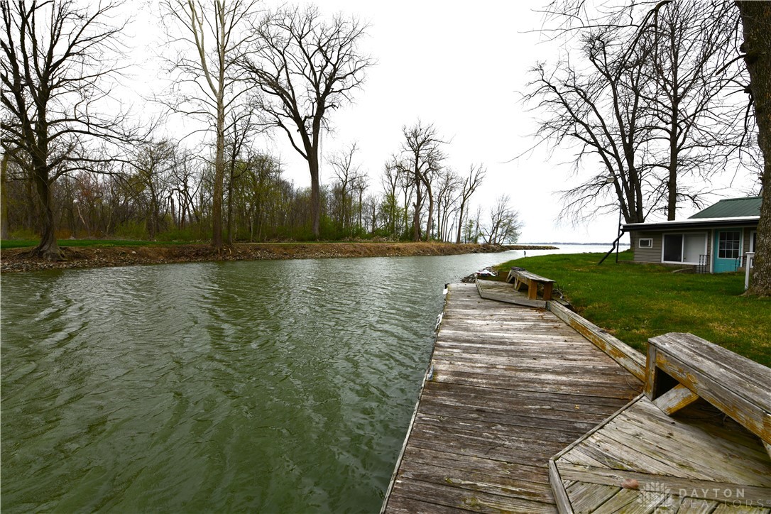 5445 Behm Road, Unit 15 Celina, OH 45822 - Photo 33 of 49 This serene waterfront property offers direct access to a tranquil canal with a private dock.