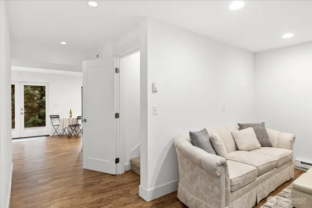 a room with a couch and a television