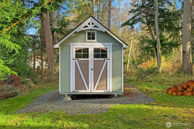 a view of a building with a yard