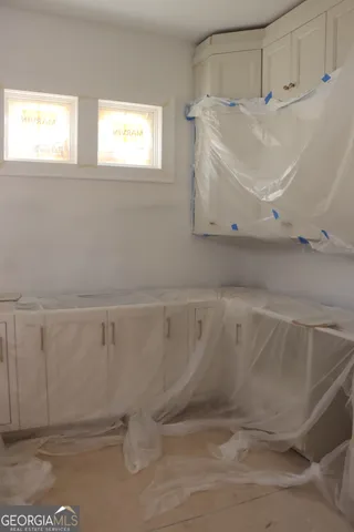 an empty room with windows