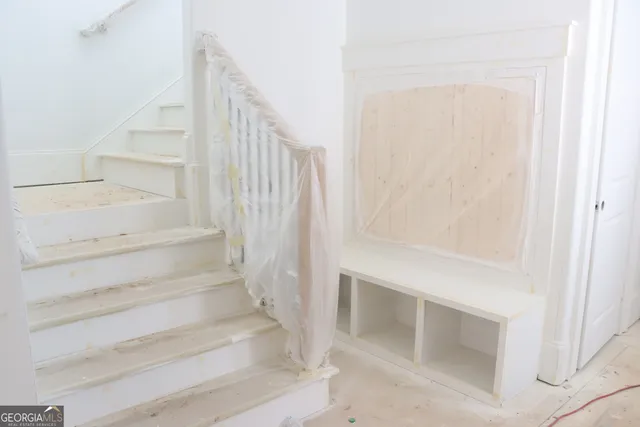 a view of an empty room and a window