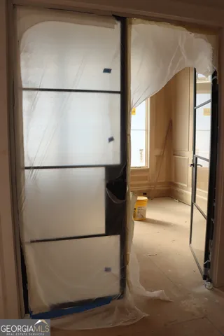 a bathroom with a bathtub and shower