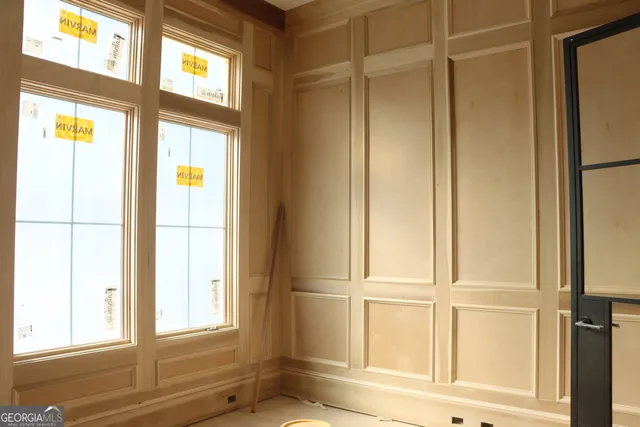 an empty room with windows