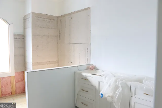 a front view of a building with street view