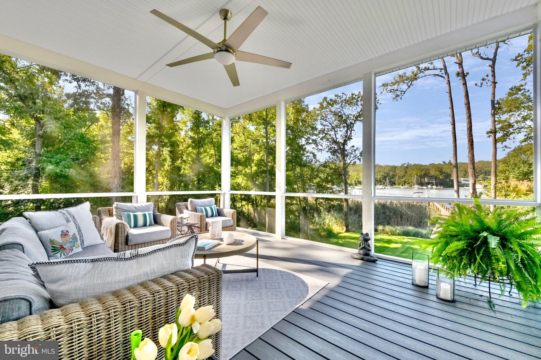 946 Benning Road Galesville, MD 20765 - Photo 13 of 57 a living room with furniture and floor to ceiling windows