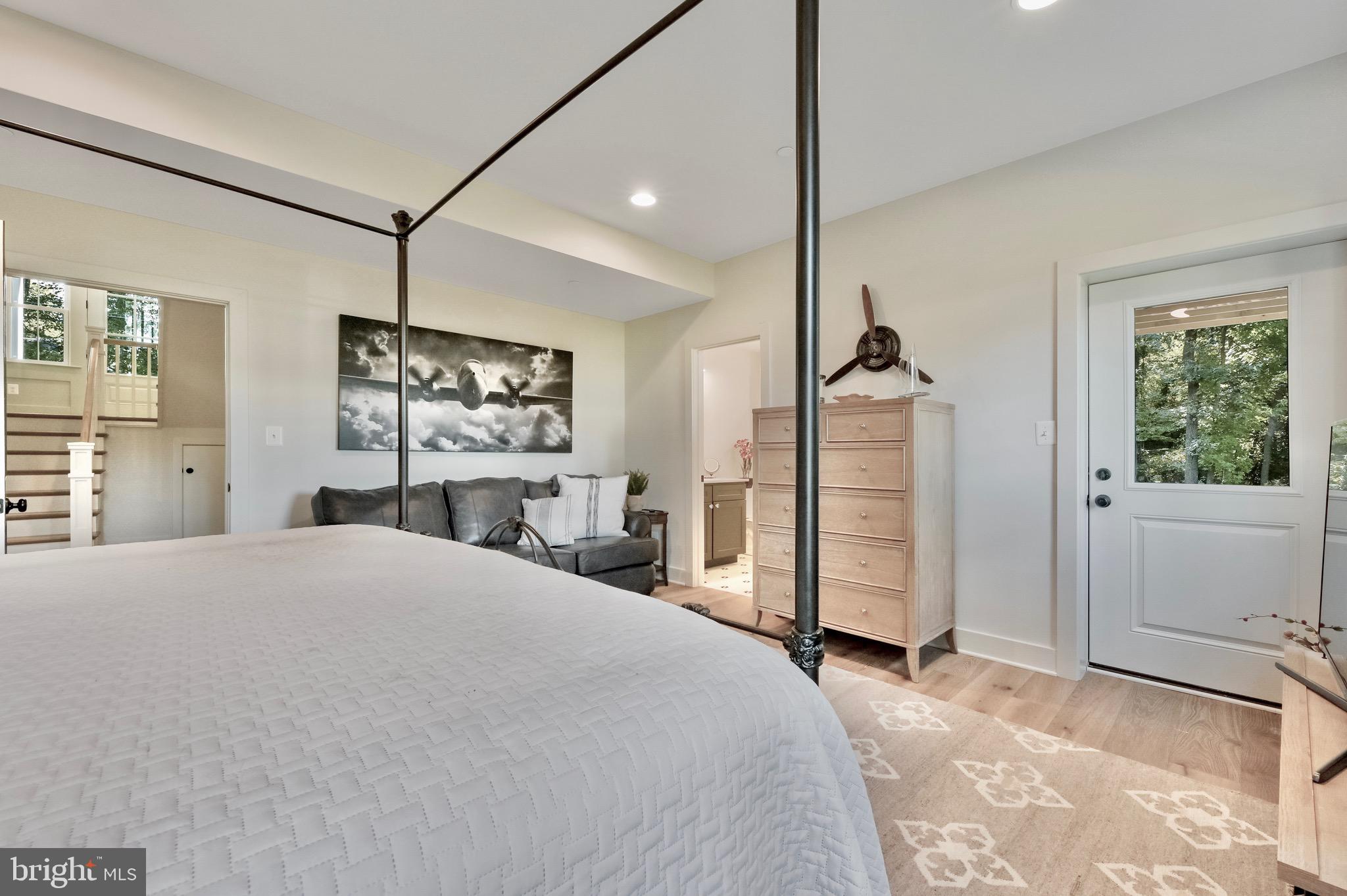 946 Benning Road Galesville, MD 20765 - Photo 21 of 59 a bedroom with a bed and a flat screen tv