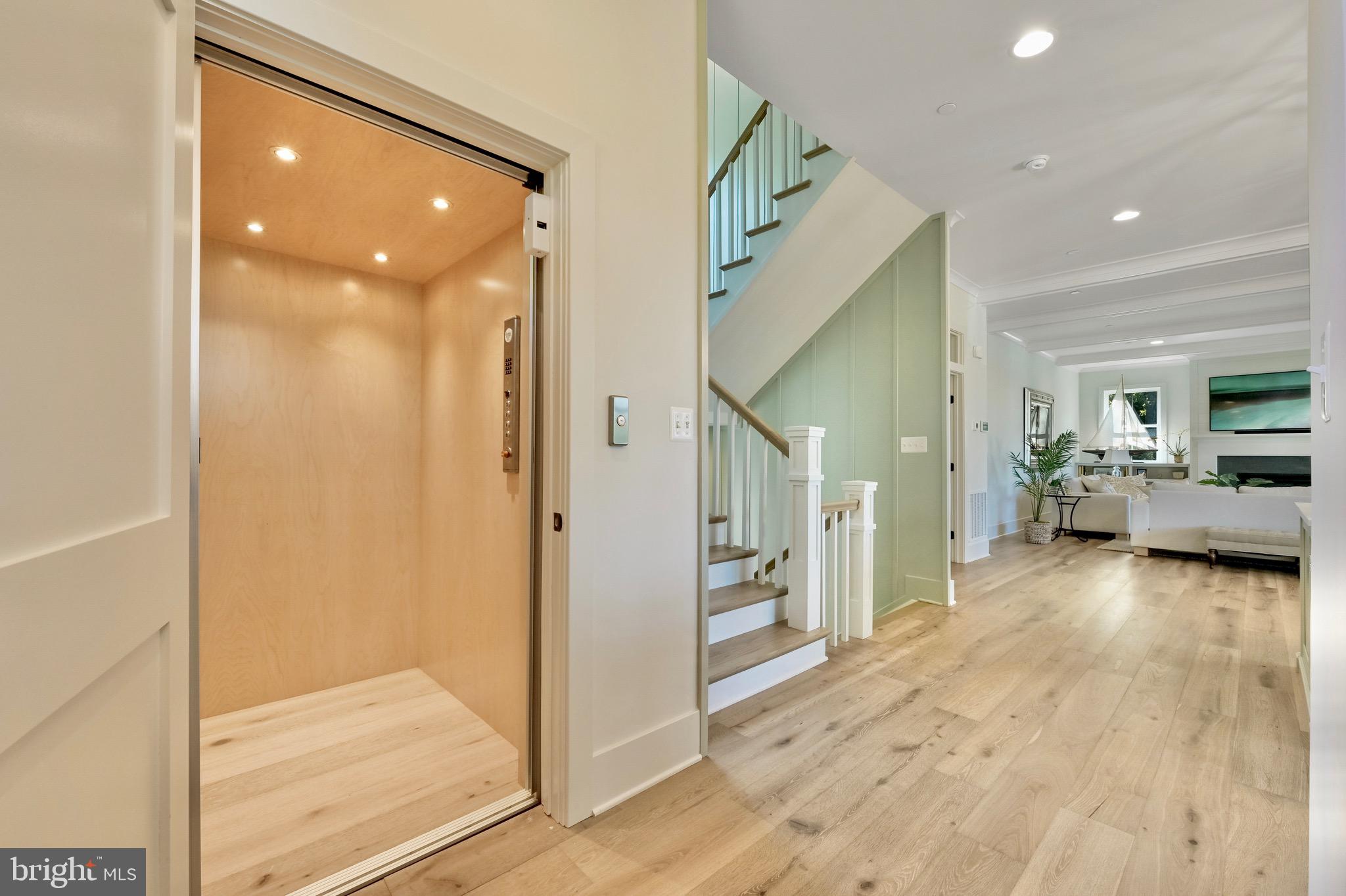 946 Benning Road Galesville, MD 20765 - Photo 22 of 59 a view of a hallway view with living space with furniture and a view of living room