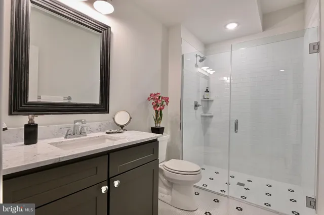 an aerial view of a houses with a lake view