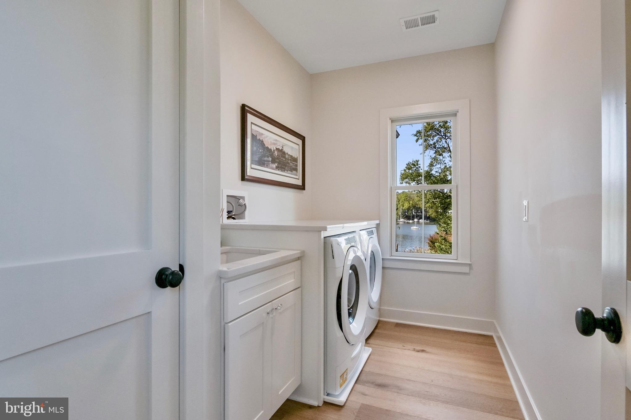 946 Benning Road Galesville, MD 20765 - Photo 33 of 57 a view of livingroom with washer and dryer
