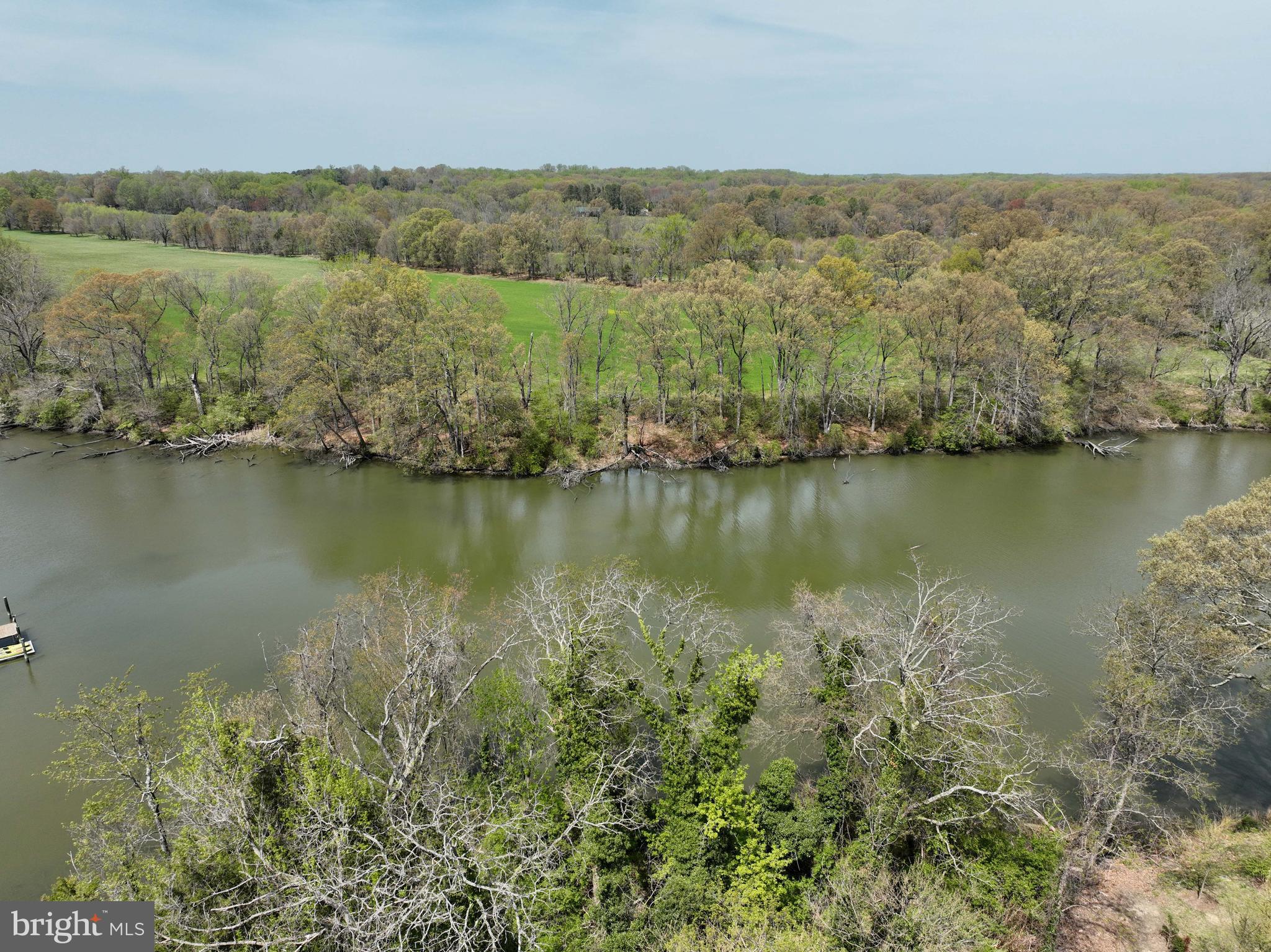 946 Benning Road Galesville, MD 20765 - Photo 35 of 57 an aerial view of a houses with a lake view