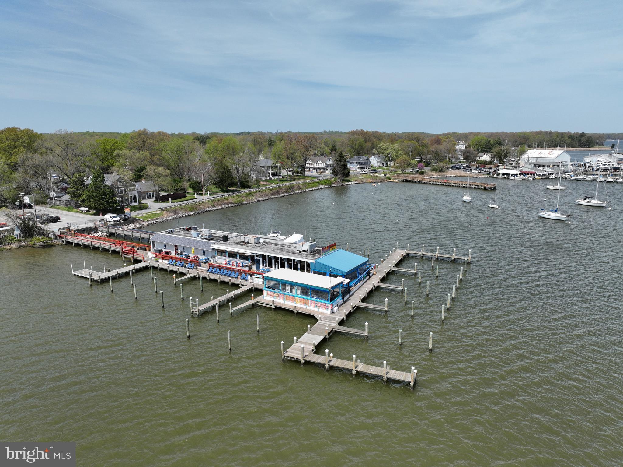 946 Benning Road Galesville, MD 20765 - Photo 51 of 59 an aerial view of a house with a lake view