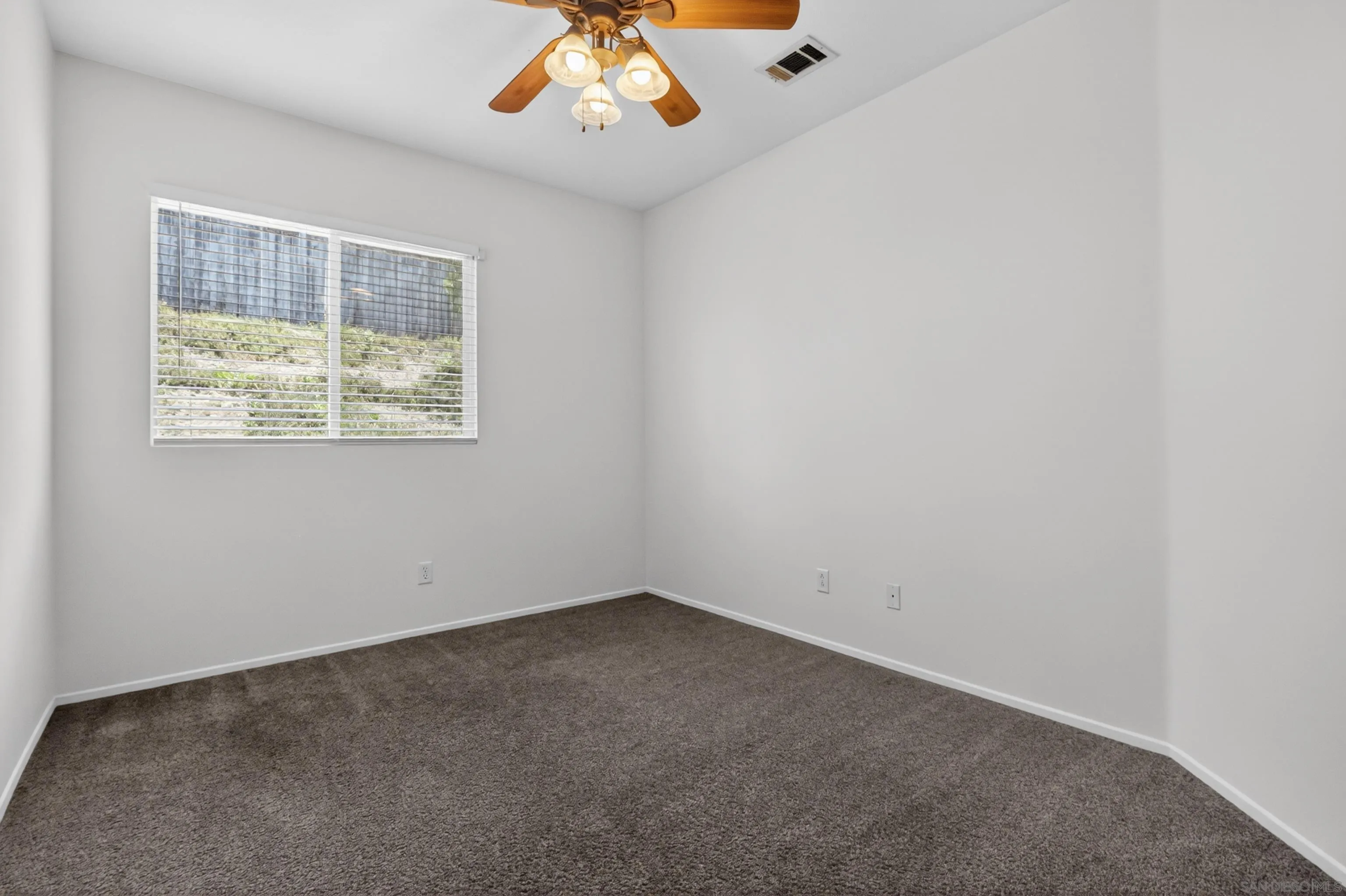 1432 Belmont Park Road Oceanside, CA 92057 - Photo 36 of 54 an empty room with a window