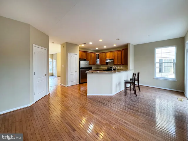 a view of kitchen with table and chair