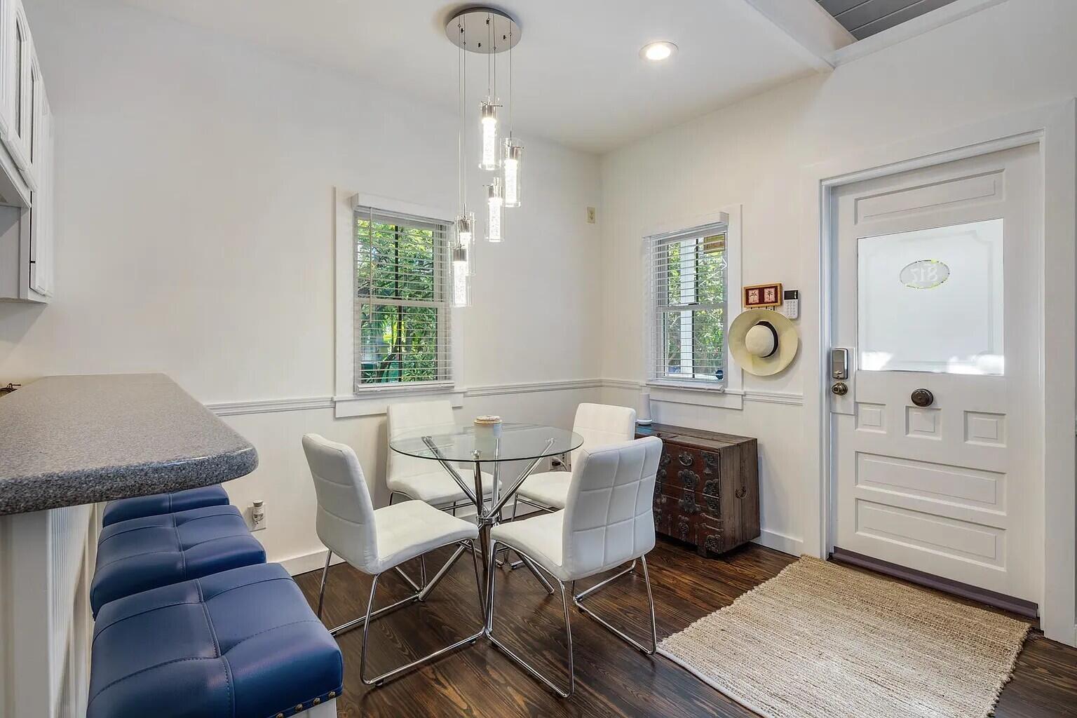 817 Terry Lane Key West, FL 33040 - Photo 12 of 20 a view of a dining room with furniture and window