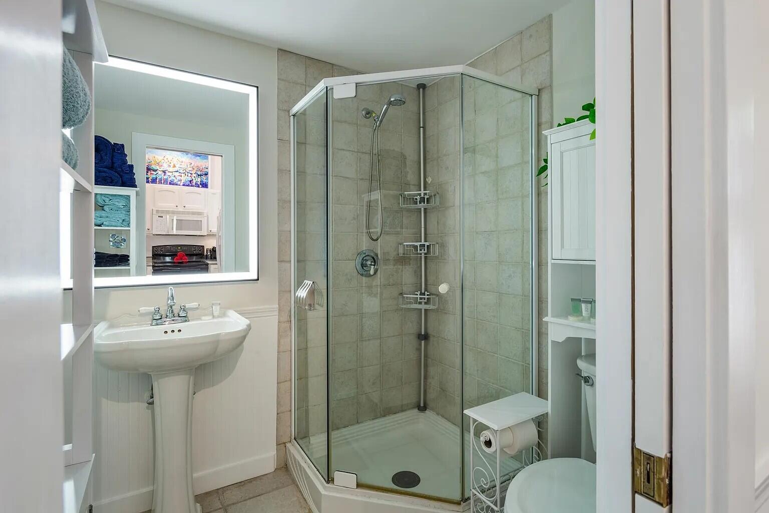 817 Terry Lane Key West, FL 33040 - Photo 17 of 20 a bathroom with a sink toilet and shower