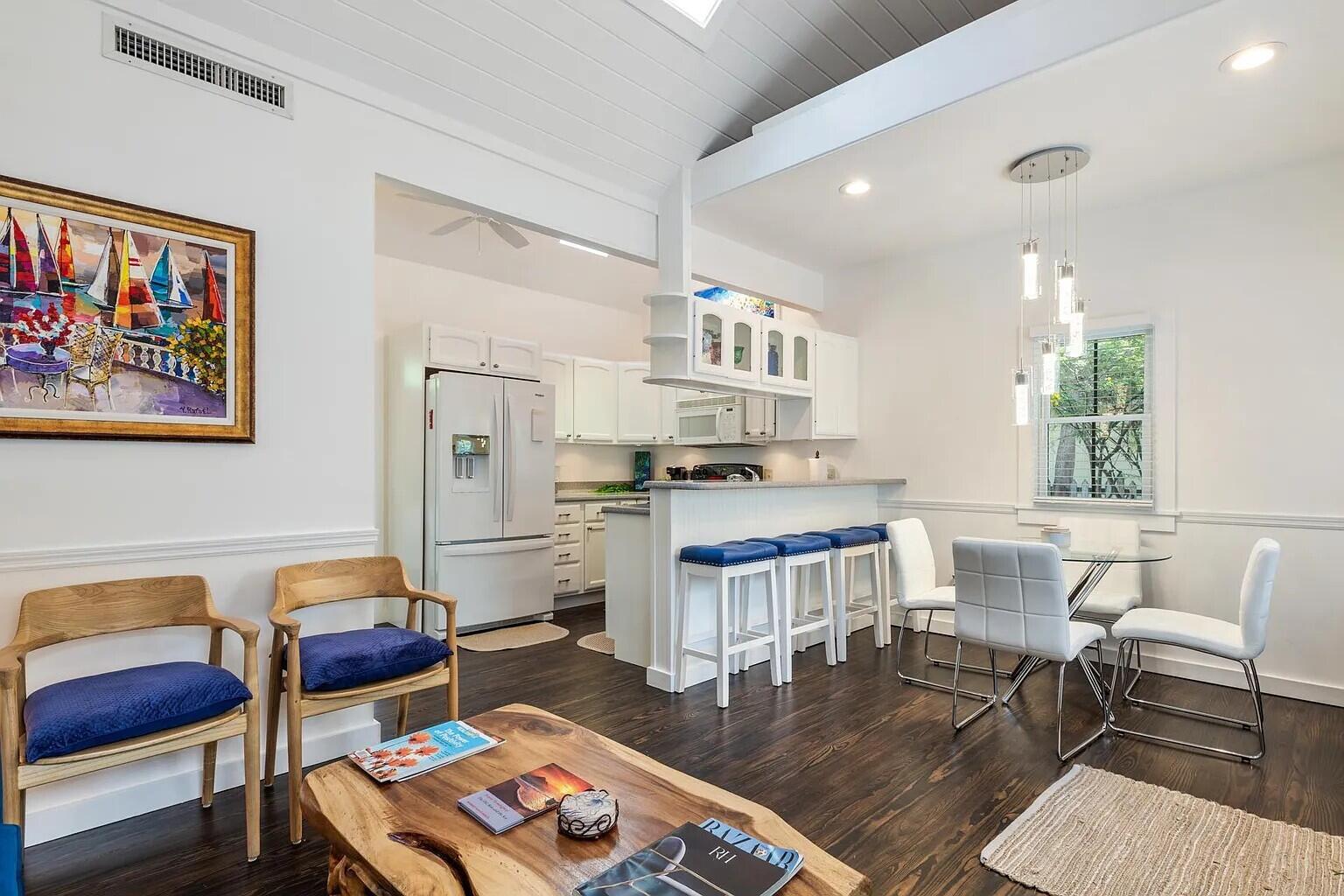 817 Terry Lane Key West, FL 33040 - Photo 4 of 20 a living room with stainless steel appliances furniture and a dining table with wooden floor