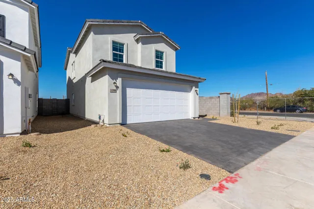 a house view with a outdoor space