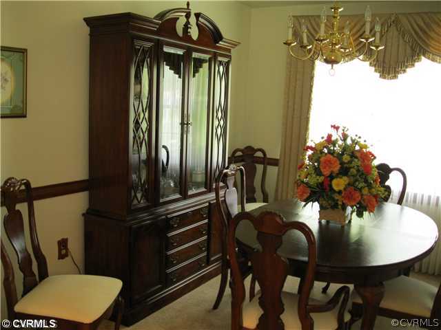 11300 Celtic Road Chesterfield, VA 23838 - Photo 9 of 12 a view of a dining room with furniture and window