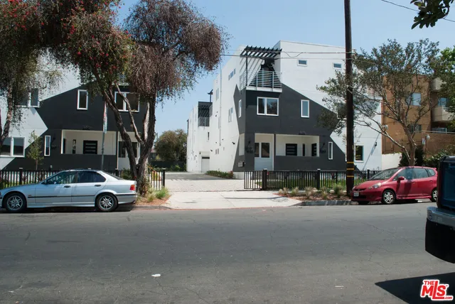 a cars parked in front of a building