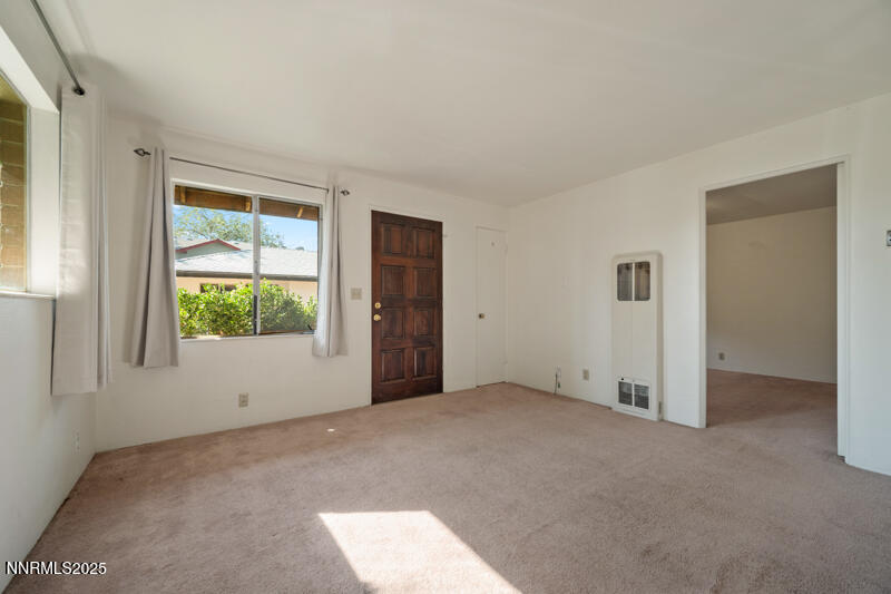 1245 Plumas Street Reno, NV 89509 - Photo 3 of 16 an empty room with windows
