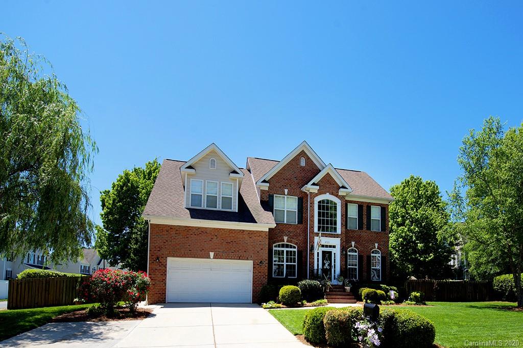 4322 Sunset Rose Drive Fort Mill, SC 29708 - Photo 2 of 34 a front view of a house with garden