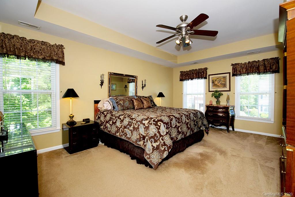 4322 Sunset Rose Drive Fort Mill, SC 29708 - Photo 12 of 34 a bedroom with a bed and window