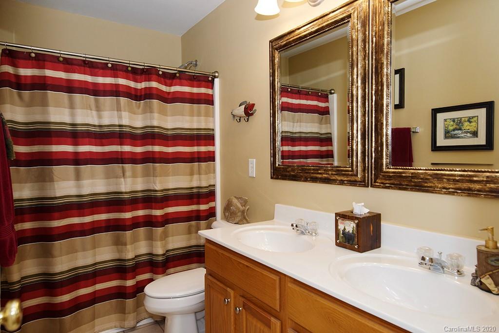 4322 Sunset Rose Drive Fort Mill, SC 29708 - Photo 16 of 34 a bathroom with a sink and a mirror