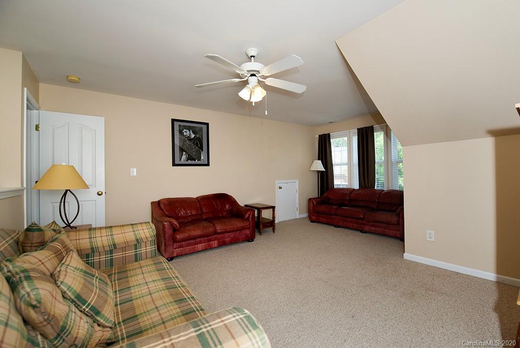 4322 Sunset Rose Drive Fort Mill, SC 29708 - Photo 20 of 34 a living room with furniture and a ceiling fan