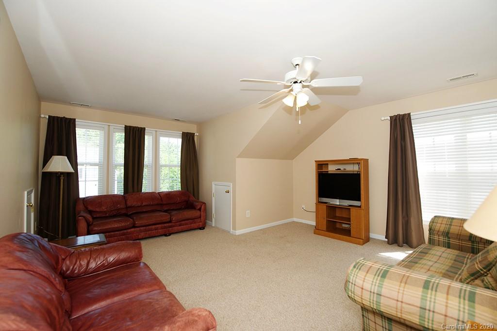 4322 Sunset Rose Drive Fort Mill, SC 29708 - Photo 21 of 34 a living room with furniture and a flat screen tv