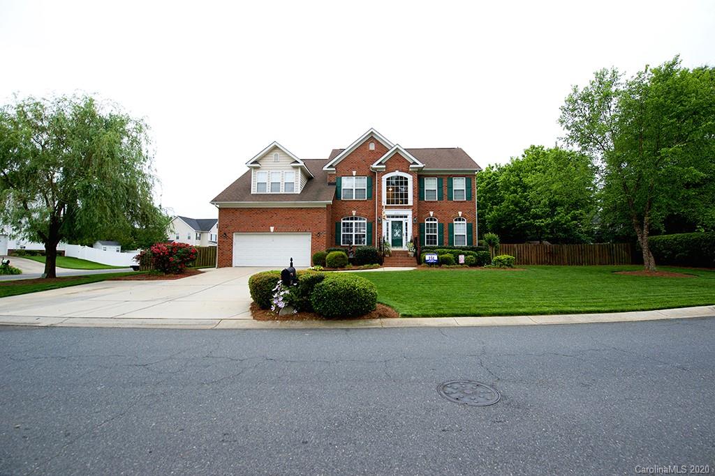 4322 Sunset Rose Drive Fort Mill, SC 29708 - Photo 30 of 34 a front view of a house with a yard and garage