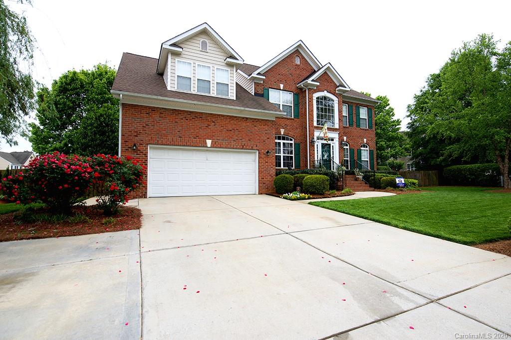 4322 Sunset Rose Drive Fort Mill, SC 29708 - Photo 34 of 34 a front view of a house with a garden