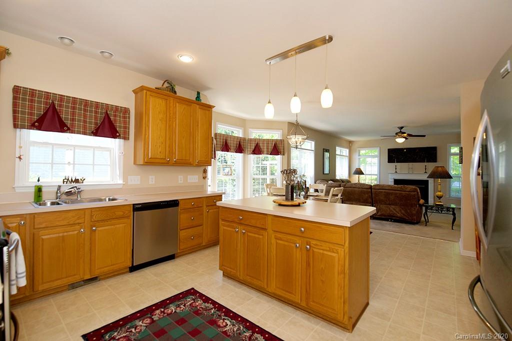 4322 Sunset Rose Drive Fort Mill, SC 29708 - Photo 7 of 34 a kitchen with sink cabinets and window