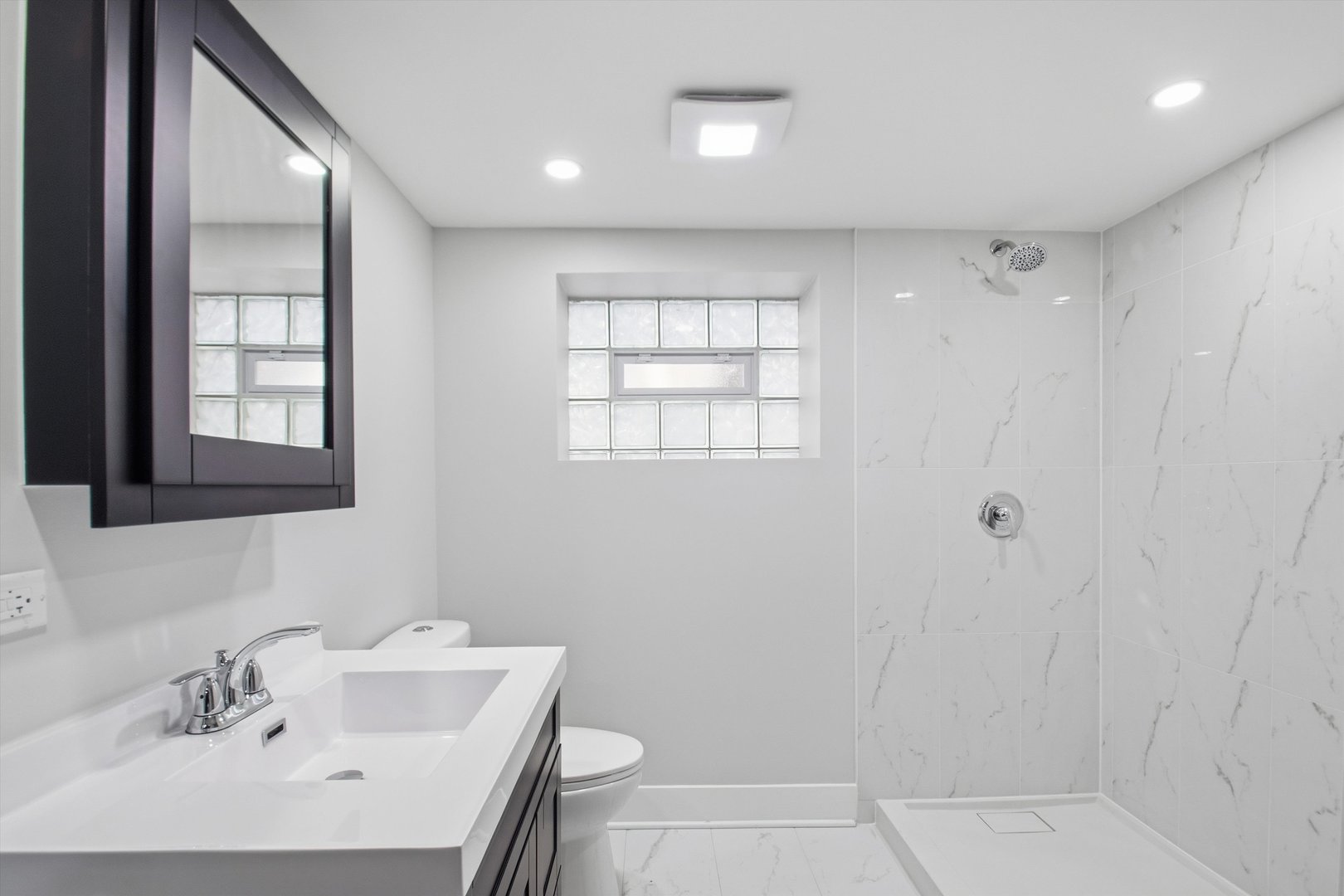 9953 South Prospect Avenue Chicago, IL 60643 - Photo 30 of 35 a bathroom with a sink toilet and shower