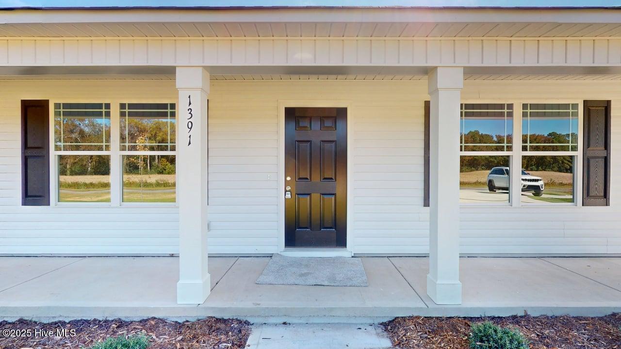 1391 Pinkney Road Pikeville, NC 27863 - Photo 3 of 29 Front Porch