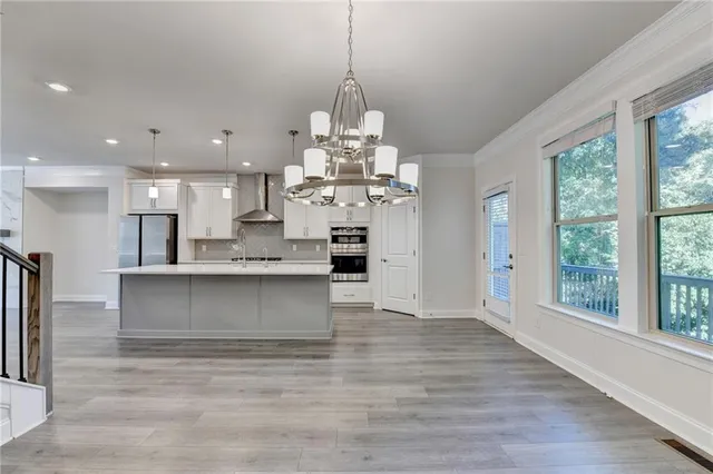 a view of kitchen and sink