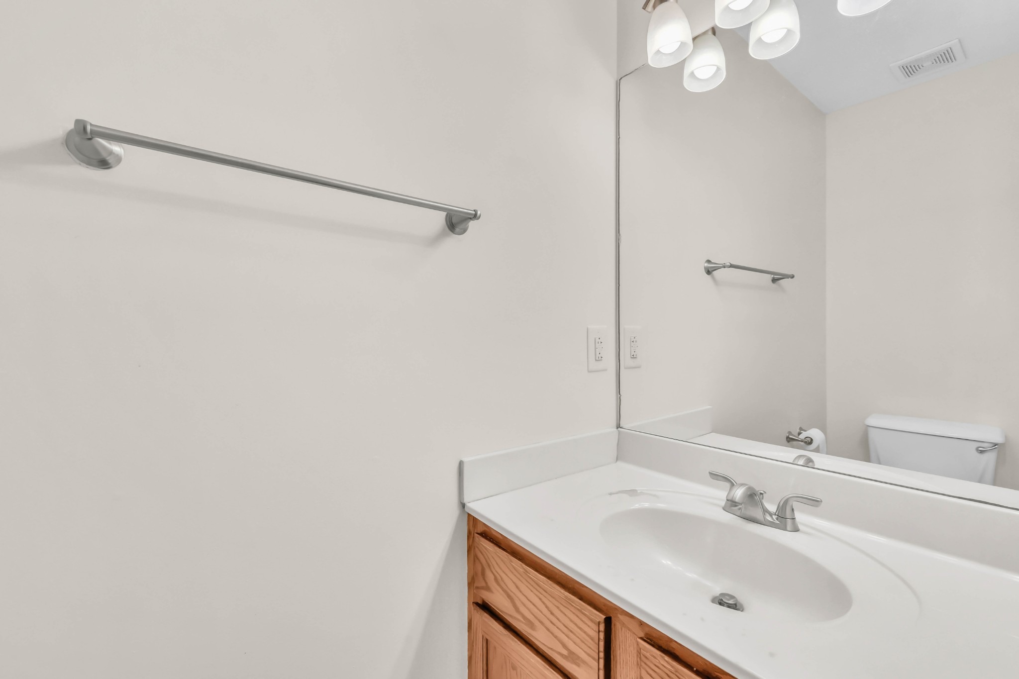 2451 Wilson Road, Unit 6 Clarksville, TN 37043 - Photo 5 of 21 a bathroom with a sink vanity and a mirror