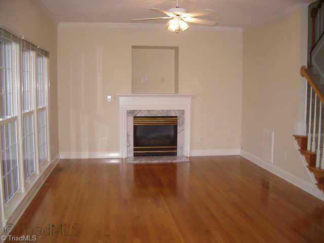3994 Braddock Road High Point, NC 27265 - Photo 6 of 9 Other. The den is the perfect size...cozy enough to be warm and inviting and spacious enough to entertain! Notice the TV nook, gas logs, and those gorgeous hardwood floors!