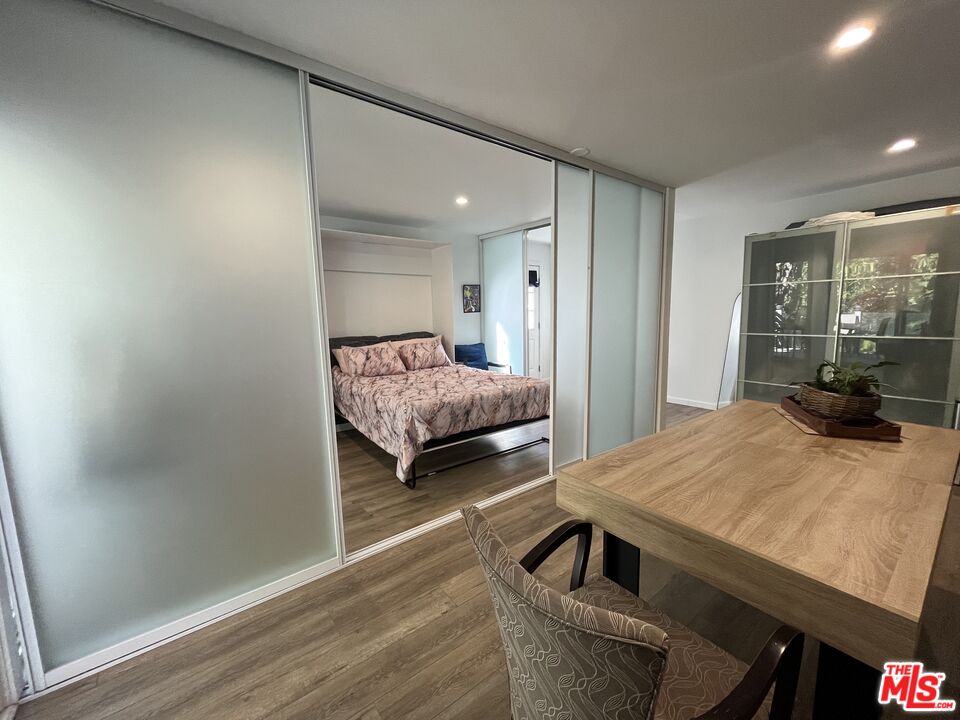 3708 Woodcliff Road Sherman Oaks, CA 91403 - Photo 6 of 14 a living room with furniture and a table