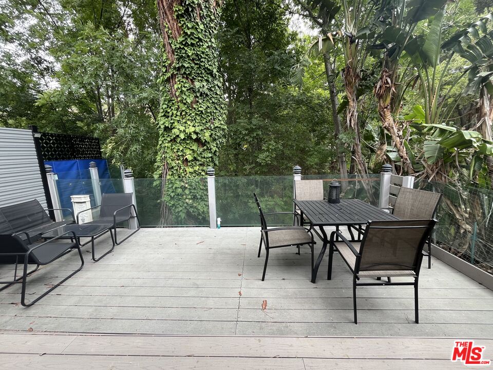 3708 Woodcliff Road Sherman Oaks, CA 91403 - Photo 9 of 14 a view of a backyard with sitting area