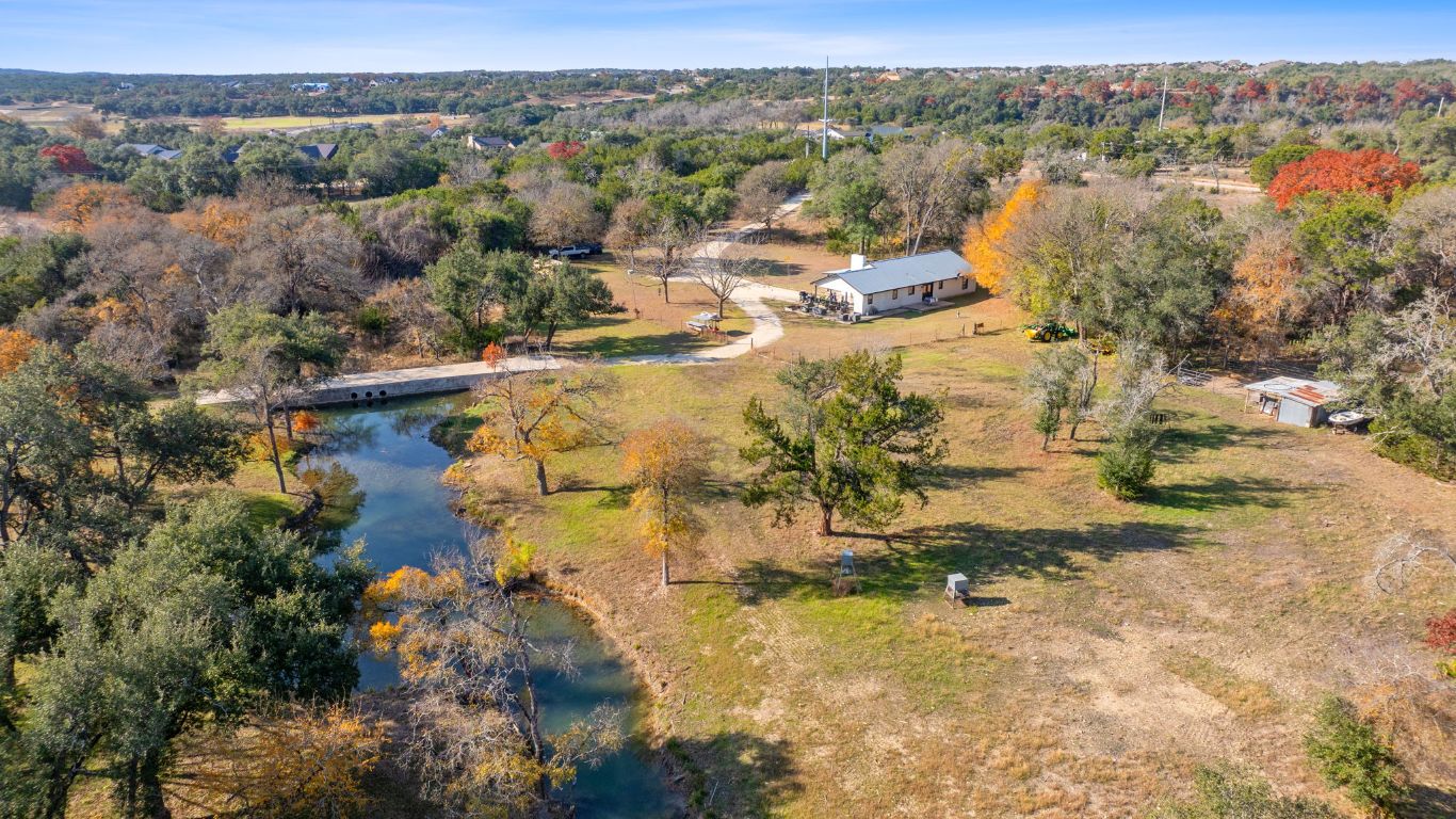 801 Needham Road Dripping Springs, TX 78620 - Photo 13 of 36 Aerial view of a nearby body of water