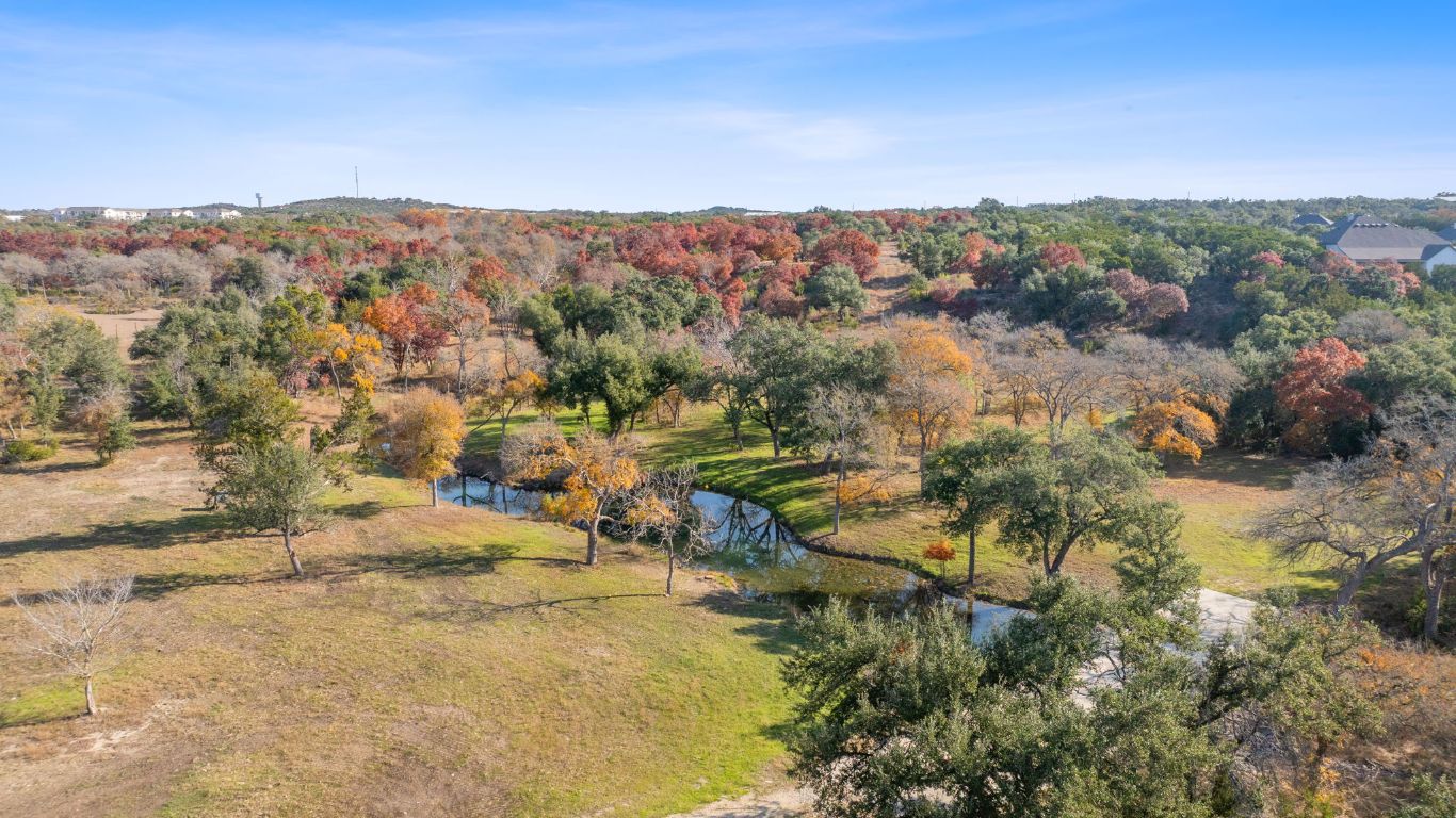 801 Needham Road Dripping Springs, TX 78620 - Photo 3 of 36 Aerial view of a large body of water