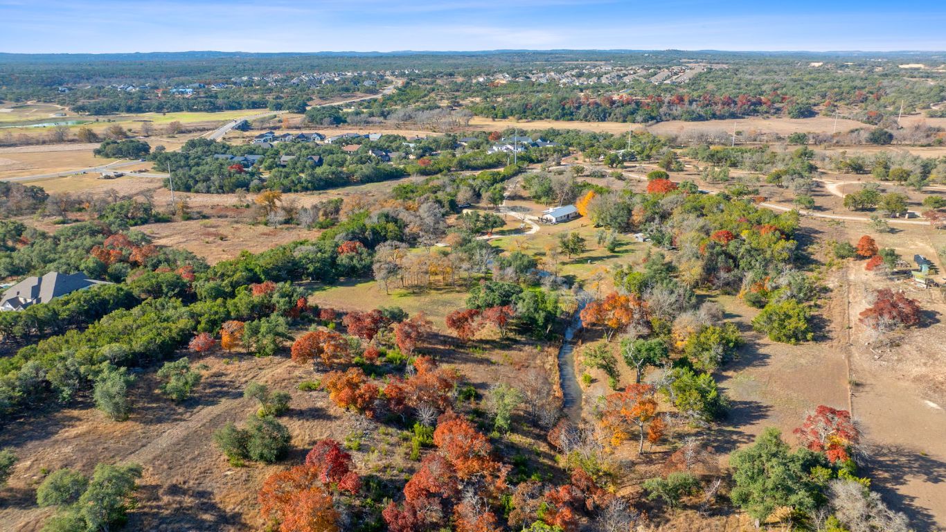 801 Needham Road Dripping Springs, TX 78620 - Photo 32 of 36 Aerial view of property and surrounding area