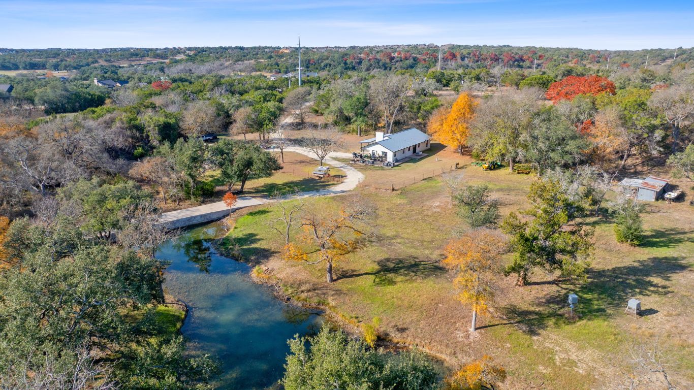801 Needham Road Dripping Springs, TX 78620 - Photo 4 of 36 View of subject property featuring a nearby body of water