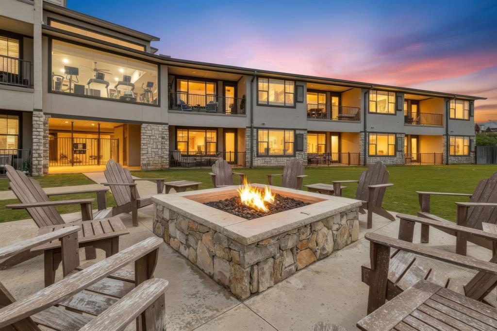 3412 Scenic Point Road, Unit 102 Graford, TX 76449 - Photo 1 of 31 a front view of a house with outdoor seating